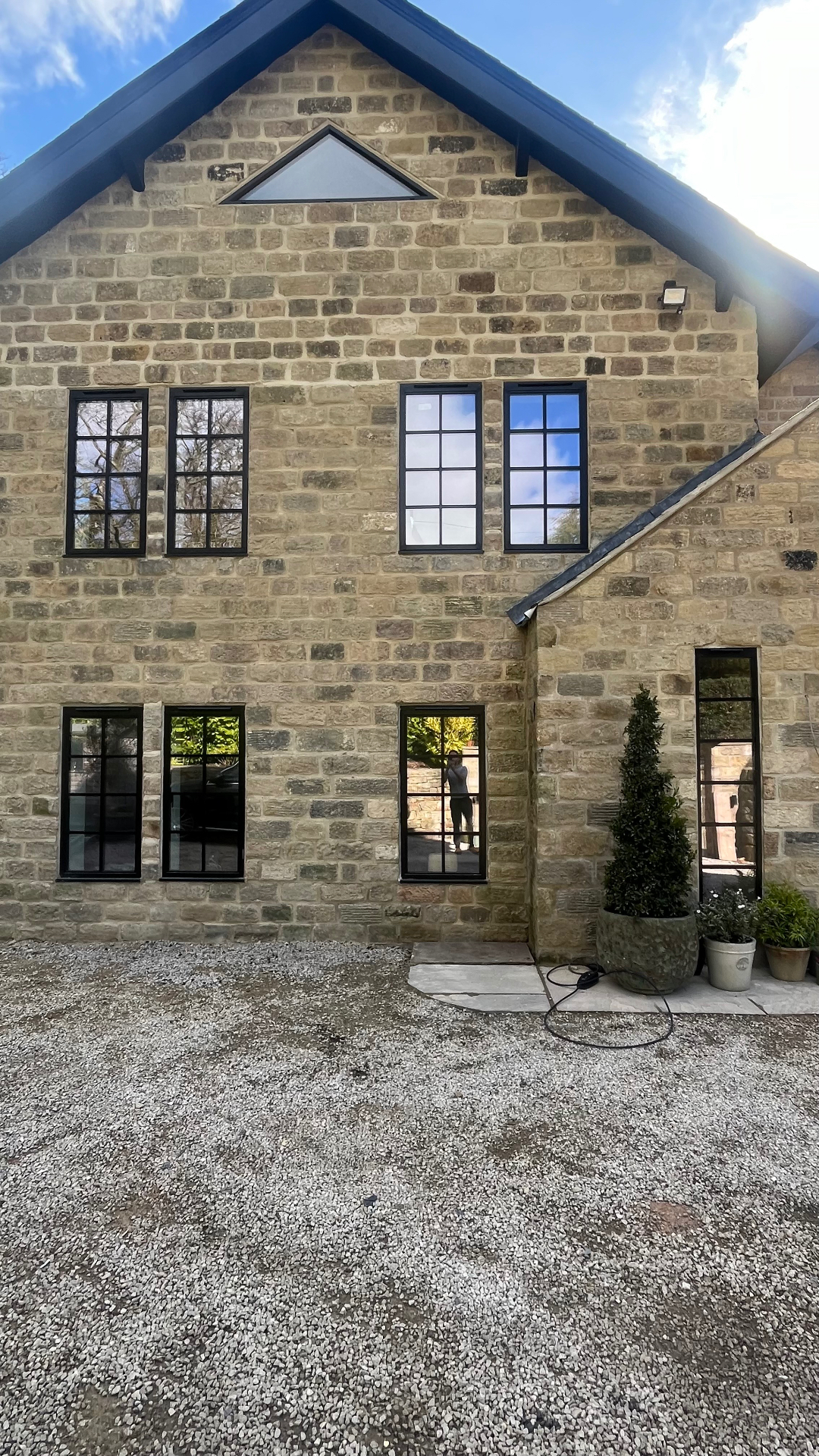Georgian bar Heritage windows set into newly dressed gritstone