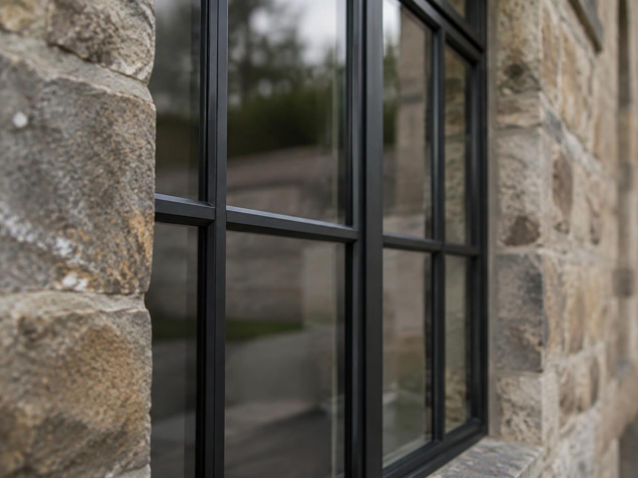 Slim black heritage glazing bars set in Yorkshire stone